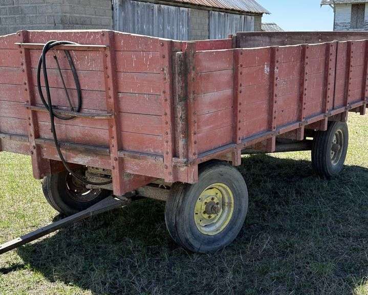 This item Selling ABSOLUTE! ~~~ Wooden Wagon with John Deere Running Gear, Includes a Cylinder to Raise the Box, Tires Hold Air, Spare Tire Included in Box, Never Used by Seller