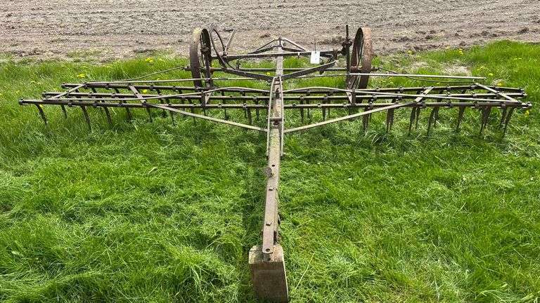 Antique 12' Spring Tooth Harrow with Cast Iron Spoked Wheels