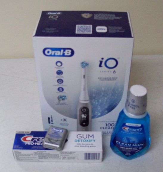 Oral-B Toothbrush, Toothpaste, and Floss