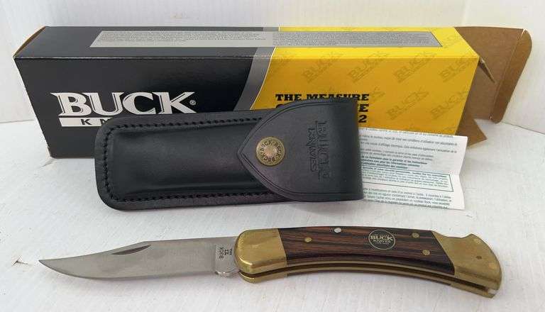 Buck Knives Buck 110 Folding Hunter, Dymondwood Handle, 100 Year Anniversary Shield, 3-1/2" Blade, Black Leather Sheath, TN551