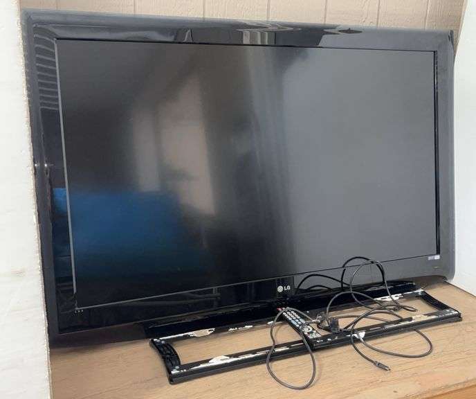 LG TV with Wall Mount Bracket and Remote