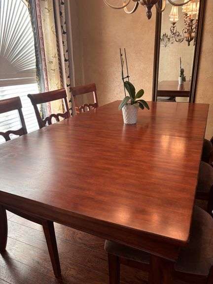 Elegant Cherry Color Wood Stained Dining Table with (6) Matching Padded Chairs and an 18" Leaf, Made of Solid Wood, Sturdy, Durable, and Built to Last, Rich Cherry Finish Adds Warmth and Style to Any Dining Room or Kitchen