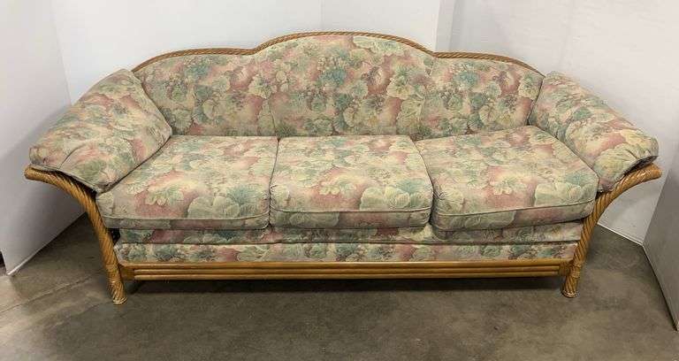 Wicker Wooden Couch with Floral Cushions