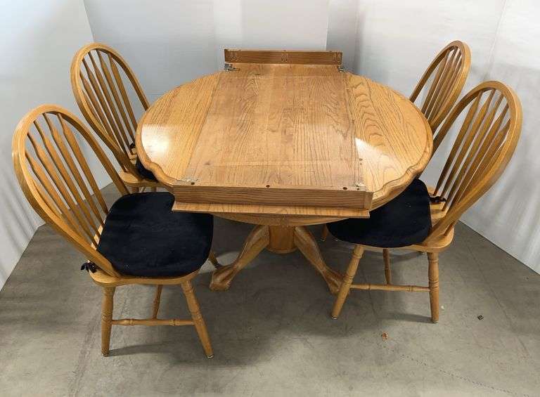 Solid Oak Pedestal Dining Table with (4) Chairs and (1) Extension Leaf, Light Honey Finish, Pedestal Base Features 4-Carved Claw Feet