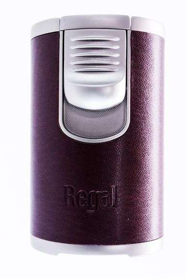 The Regal Quad flame table top lighter in light brown leather, with side mounted trigger, over-sized flame adjuster, high capacity fuel tank and all shipped in an attractive gift box... Is truly an amazing torch.