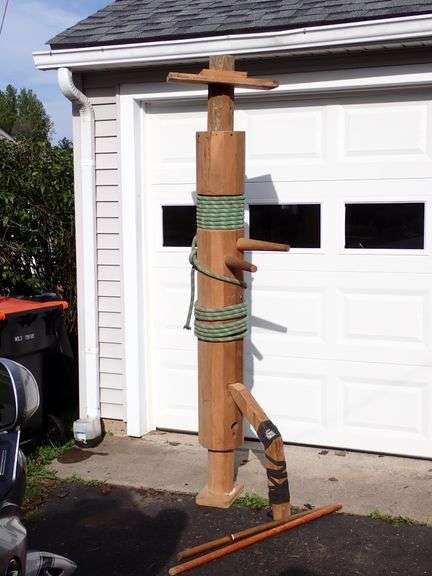 7ft tall Wing Chun Wooden Dummy with Base & Ceiling Mount blocks.  Also includes wood sword & staff
