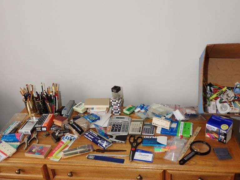Box of Office supplies - Pens Pencils Calculators staples staplers magnifying tape and more!  see al