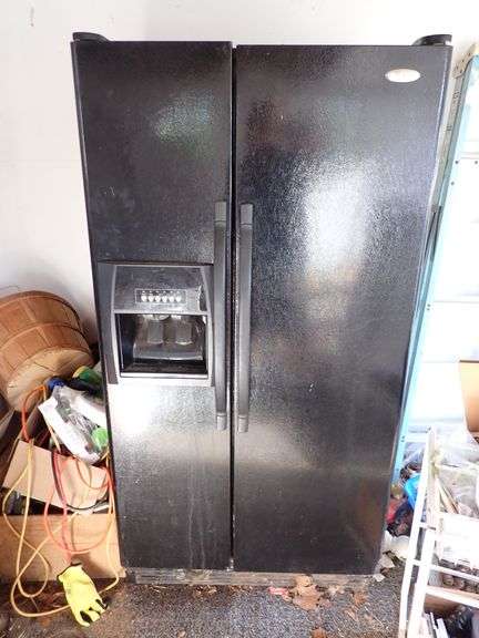 Black Whirlpool Side by Side Fridge/ Freezer w/ice maker.  Works.  Food will be removed before picku