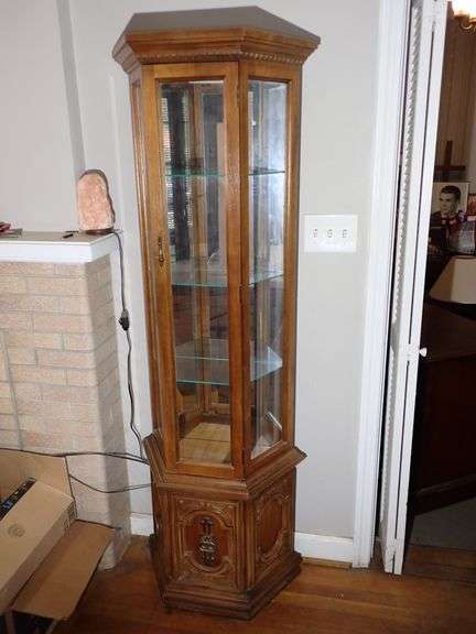 Tall 3 sided Curio Cabinet - 3 glass shelves Mirrored back & interior lighting.  Bottom storage.