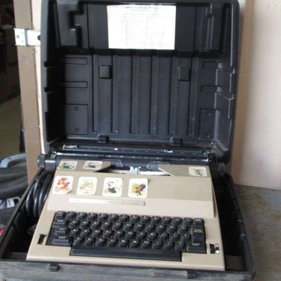 Sears Electric with correction typewriter in hard case.