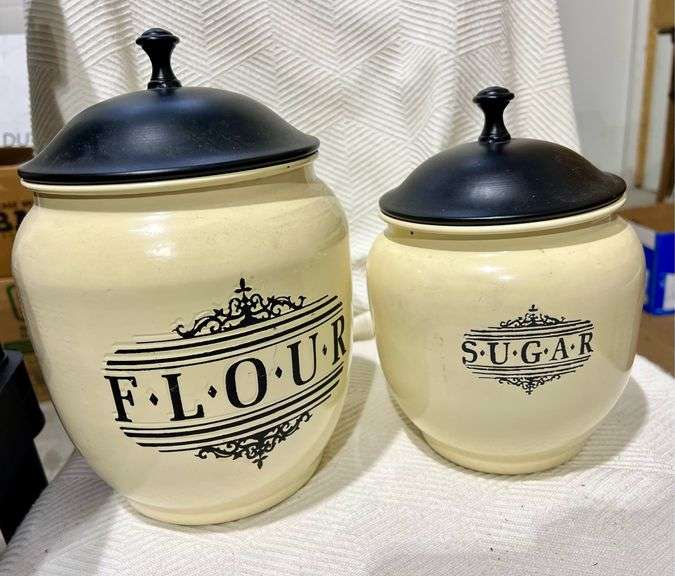 Two Metal Canisters