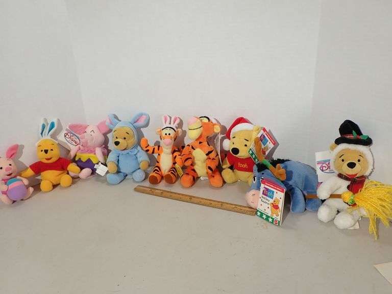 Collection of Winnie The Pooh Plush Dolls in Excellent condition