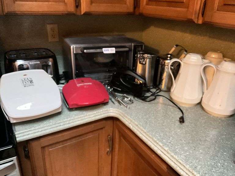 Toaster Oven, Hand Mixer, Can Opener, Toaster, 2 Foreman Grills.