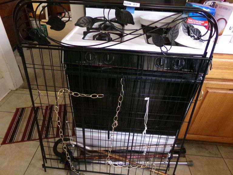 2 Piece Metal Decorative Gate, Walking Canes, Small Stool, Decorative Lantern. Stove not included.