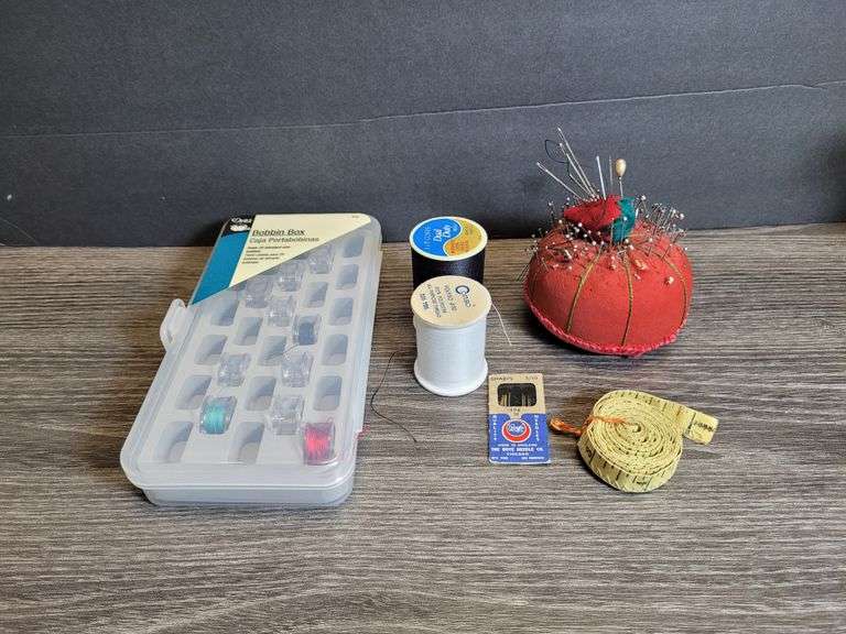 Sewing Supplies: Pin Cushion with Stick Pins; Tape Measure, Thread Bobbins in Viewable Container; Bl