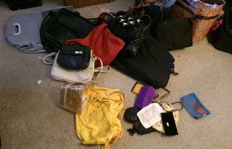 Approx. 10 Purses Various Sizes and Suitcase.