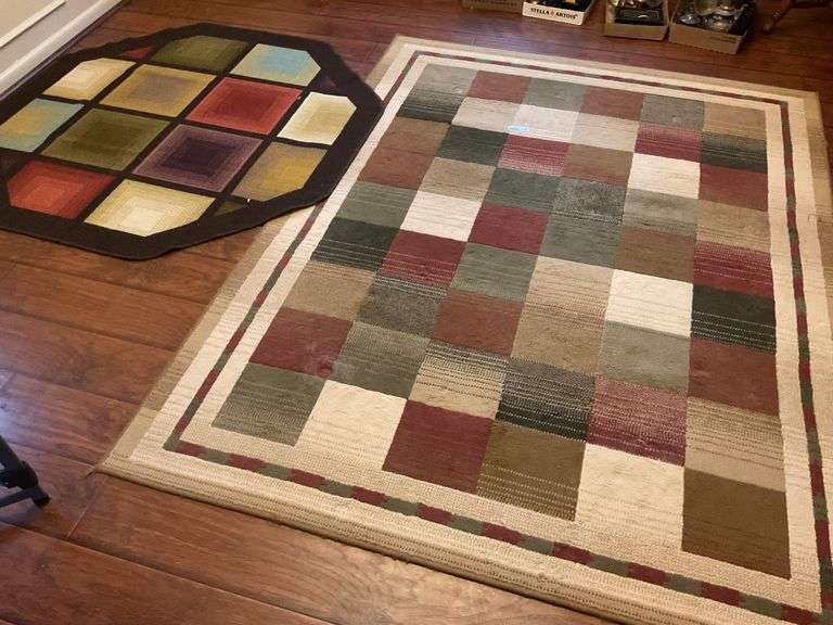2 Area Rugs - Good Condition.