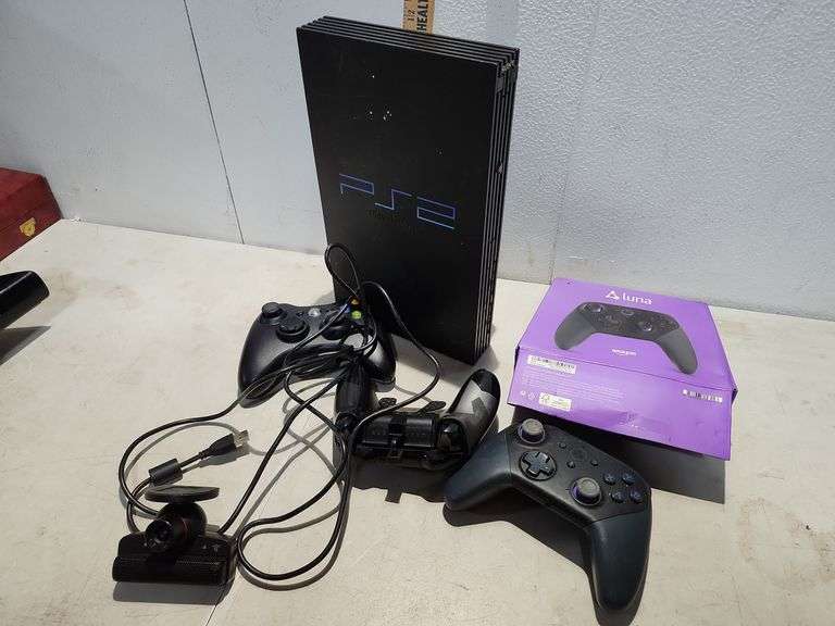 Playstation 2 Has 3 Controllers and a Webcam