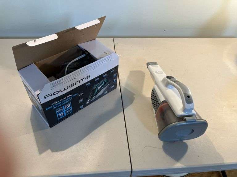 Rowenta iron in box and Black & Decker Dustbuster