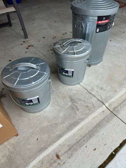 3 metal trashcans