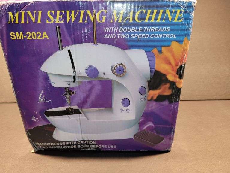 Mini Sewing Machine SM-202A With Double Threads and Two Speed Control.