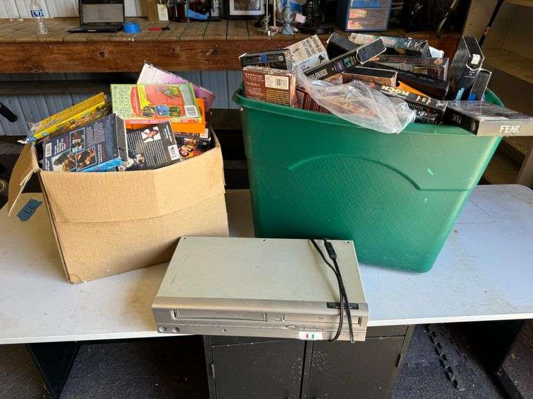 VCR and boxes of various VHS Tapes