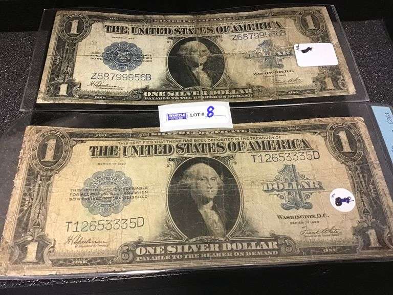 Two 1923 large size one dollar notes (very circulated, folds stains pinhole)