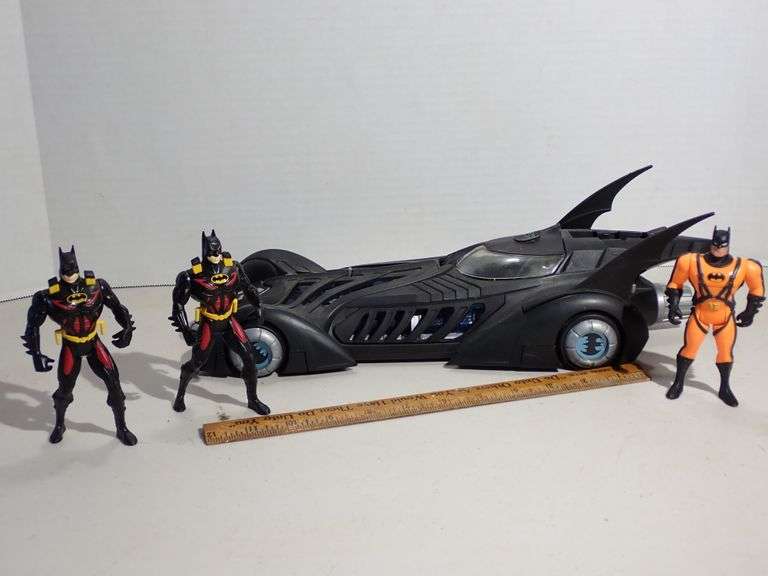 Batmobile & 3 action figures.