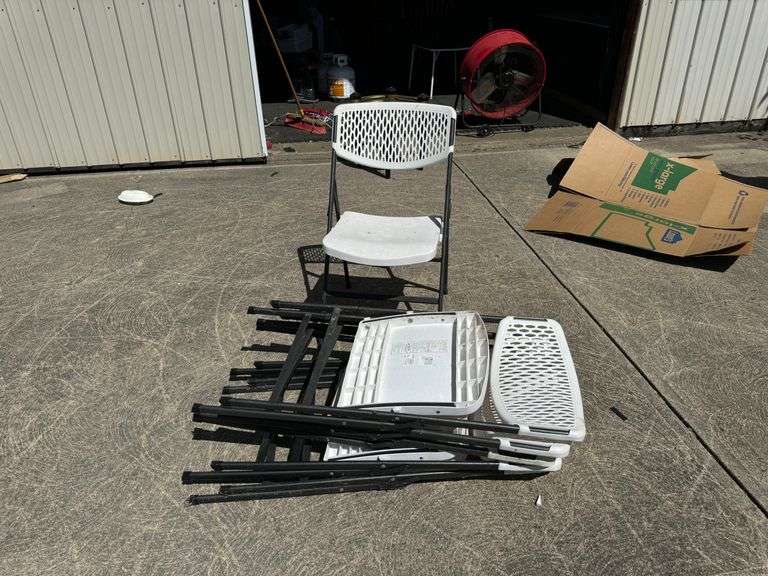 six (6) Plastic collapsible chairs