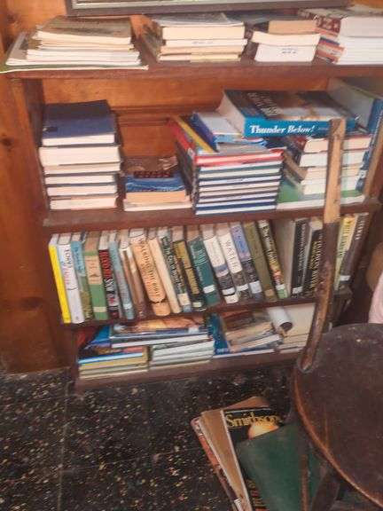 Framed Art Work, Books Shelf, and Various Books