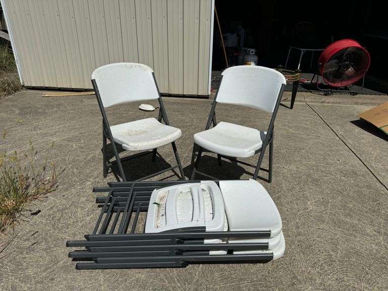 Five (5) Plastic collapsible chairs