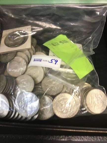 SILVER (40%) Kennedy half dollars, (91 coins)