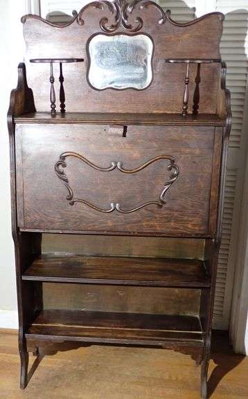 Quartersawn oak drop front desk with beveled glass mirror and lower adjustable shelf 30w12d63t