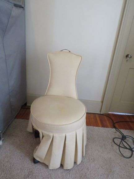 Elegant Upholstered Vanity Chair with Pleated Skirt