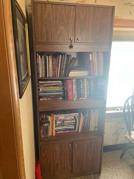 Vintage cabinet with cookbooks