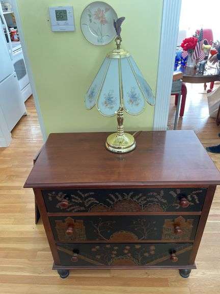 Chest of drawers with lamp