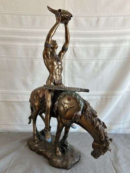 Native with Skull Sculpture