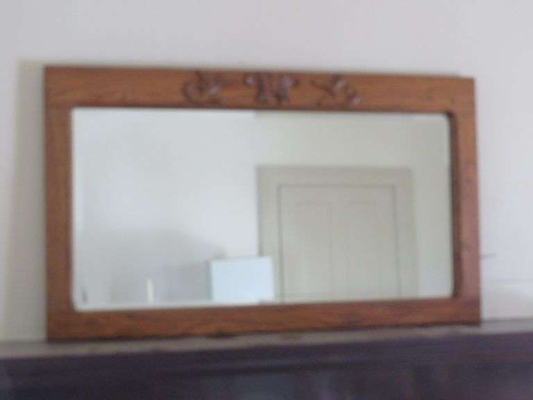 Framed Mirror with Decorative Carvings