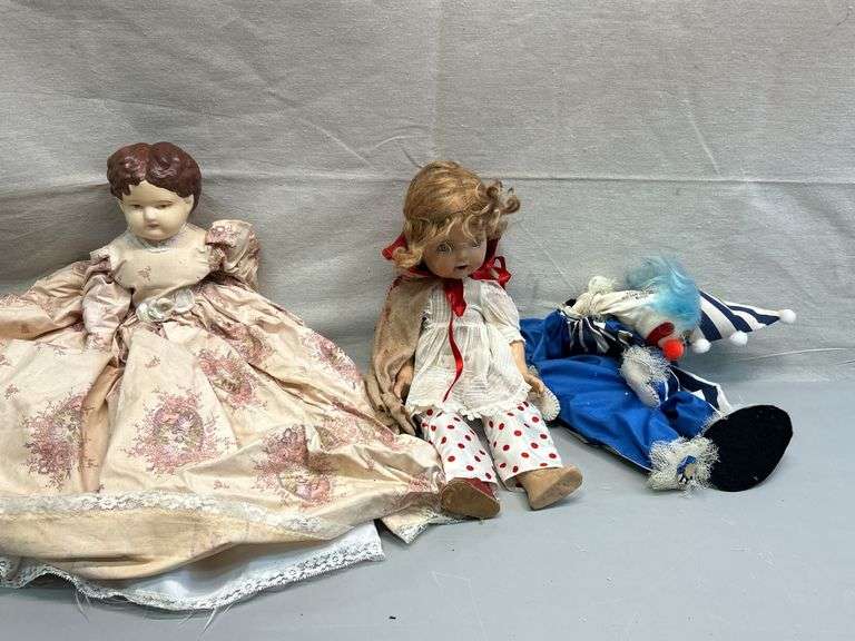 Vintage Doll Trio: Porcelain, Raggedy, and Clown Dolls