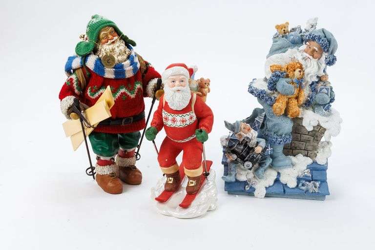 Vintage Skiing Santa Figurines.