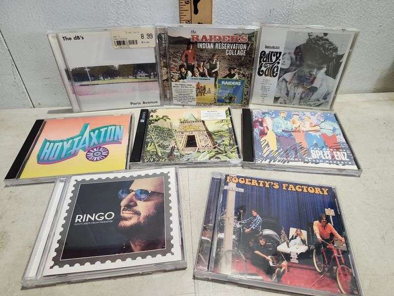 8 Assorted Cds, The dB's, The Raiders, Donovan, Split Enz, Klaatu, Hoyt Axton, John Fogerty, & Ringo