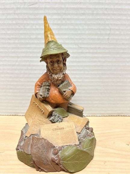 Figurine Featuring Bearded Character Surrounded by Books with Pedro TKC Marks