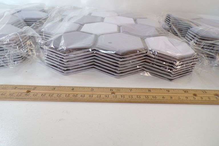 Lot of (4) 10 Packs of Peel & Stick Plastic Tiles