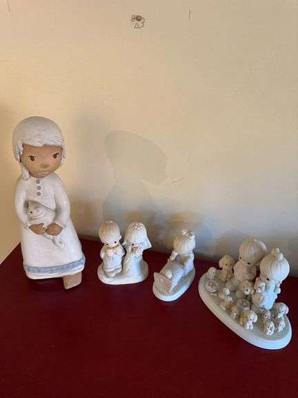 E. Carlock + Precious Moments figurines