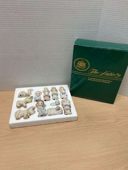 The Enesco Precious Moments Miniature Porcelain Nativity Set