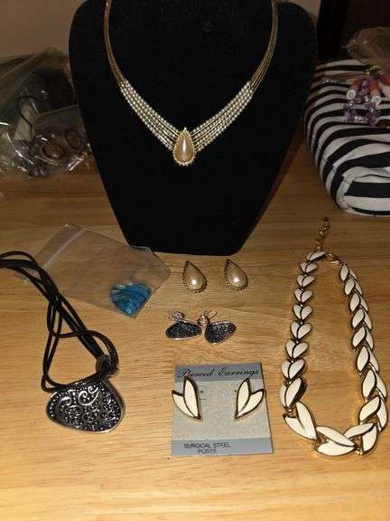 Three sets of earring and necklace pieces