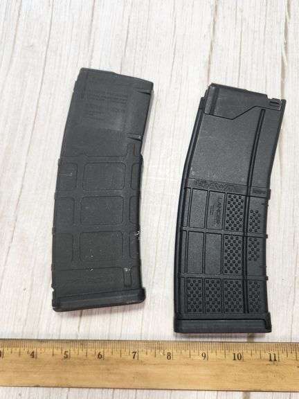 Two 5.56x45mm Polymer Rifle Magazines by Magpul and Lancer