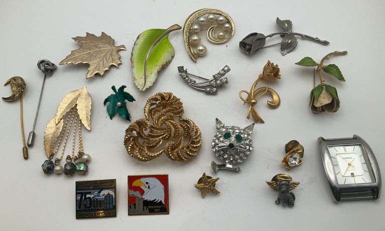 Brooches Pins and a Watch Face