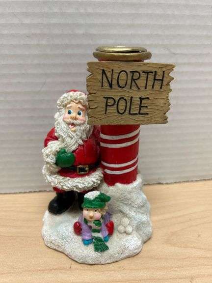 Santa Claus Figurine with North Pole Sign and Candle Holder