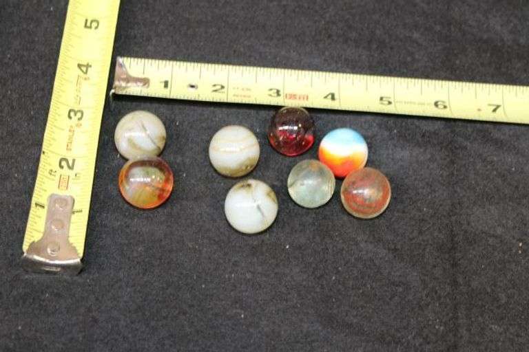 8 Vintage Glass Marbles with Varied Colors and Patterns - Auction Ohio